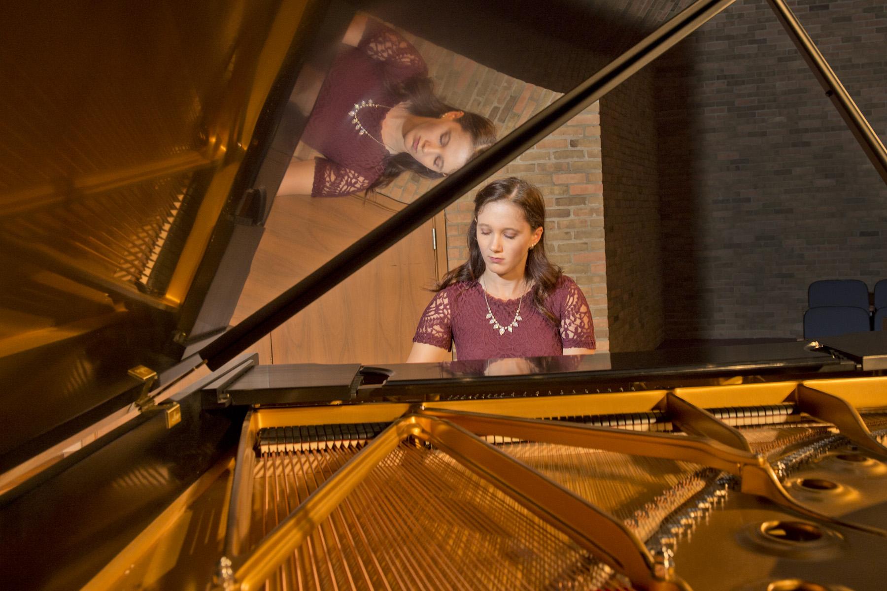 Student playing piano